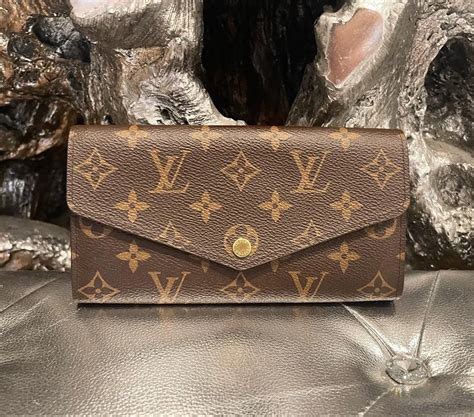 how much is a louis vuitton sarah wallet|louis vuitton vernis sarah wallet.